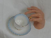 Hand With Tea Cup Sculpture 